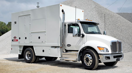 enclosed lube truck with fuel on Peterbilt chassis tandem axle.  IMT equipment, eliptical diesel fuel tank.